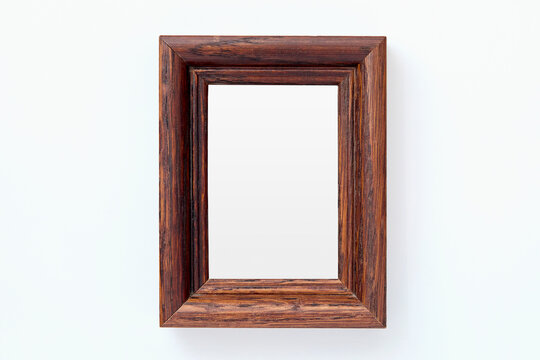 Wooden picture frame on white background