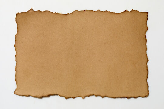 Torn vintage paper on white background