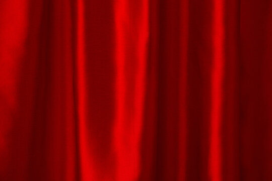 Close-up od red satin curtain