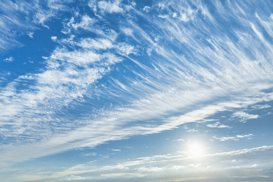 Cirrus clouds with blues only sky with sun