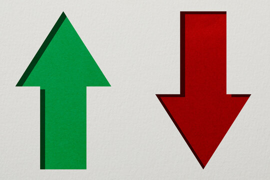 Red and green arrows on white textured background