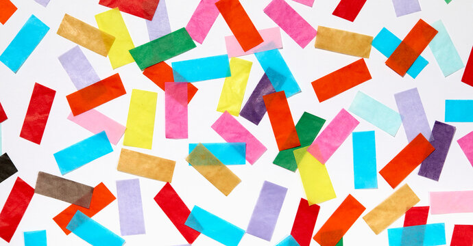 Colorful confetti on white background