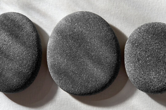 Stones on white textured background