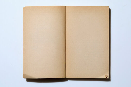 Studio shot of open blank notepad
