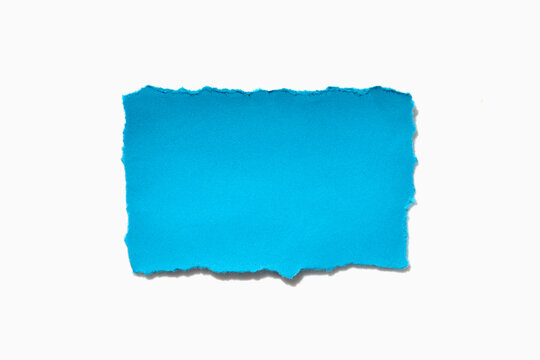 Torn blue Paper on white background
