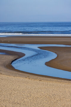S-shaped Ecola Creek flowing into Pacific Ocean