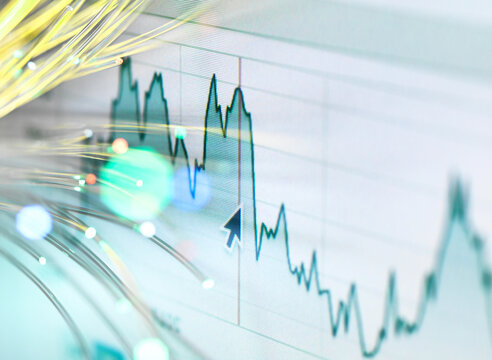 Financial charts and fibre optics symbolizing innovative stock market developments