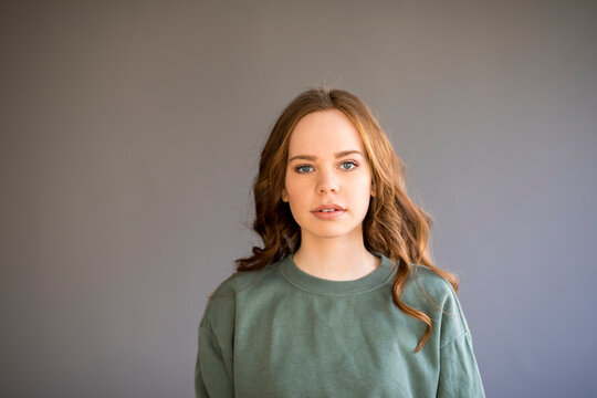 Portrait of a teenage girl, looking at camera