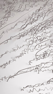 Abstract tangled silver wire pattern on white background