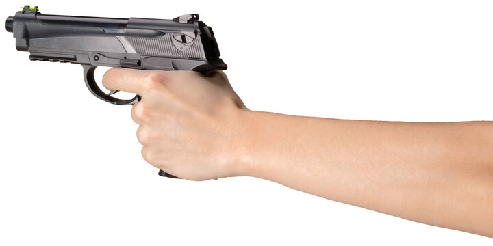 Gun held by a hand in a straight position on a plain background