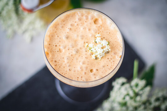 Espresso shakerato espresso-shakerato mocktail topped with Elderberry