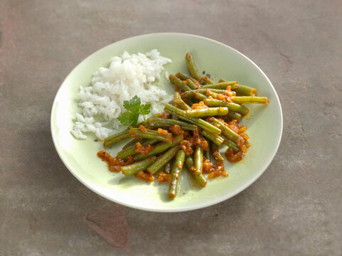 Green bean medley with cooked rice side dish
