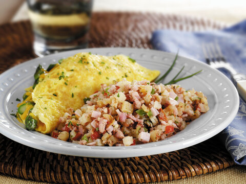Canadian Bacon hash and cheddar asparagus omelette breakfast