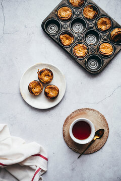 Rooibos Tea Custard Tarts with a cup of Tea in kitchen setting