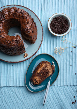 Vegan marble cake with nougat-chocolate icing and sprinkles