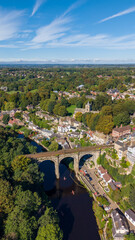 Aerial Photo Knaresborough. Knaresborough is a market and spa town and civil parish on the River Nidd in North Yorkshire, England. It is three miles (five kilometres) east of Harrogate  © Brian