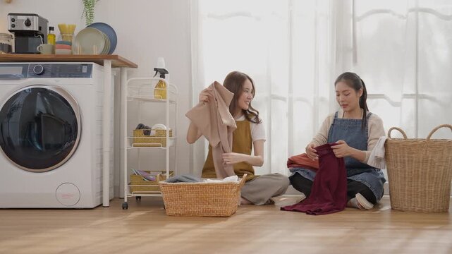 Woman Cleaning and Washing Machine Laundry Scene Sorting Colorful Clothing and Garments Beside Woven Basket in Bright Home Interior with Modern Appliance and Calm Household Chore Routine