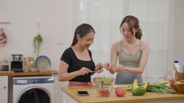 Asian woman adult kitchen food preparation healthy eating care health well being food and joyful nutrition as women prepare fresh produce together at home kitchen for daily wellness