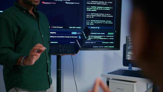 Professional Indian Software Engineer Presenting and Explaining Software Deployment Generative Artificial Intelligence Application Development to Colleagues During Professional Technical Meeting.