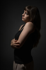 Young woman looking up thoughtfully in side profile portrait © soleg