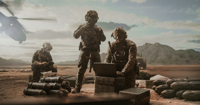 Armed Infantry Unit Inventories Mortar Shells and Ordnance Crates at a Dusty Forward Ammunition Point, One Operator Typing on a Rugged Laptop While a Rifleman Guards and a Helicopter Lifts Off.