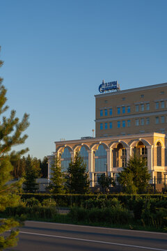 Vertical view of a Gazprom office building beside a walkway in Ukhta, Komi Republic