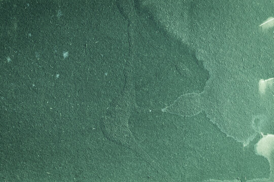 empty textured pattern background design for craft projects - Abstract dark green handmade paper cardboard craft paper texture with recycled inclusions film grain effect, subtle fiber