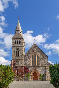 Front facade of St. Mary's Church in Howth, Ireland. Daytime view showcasing historic stone architecture