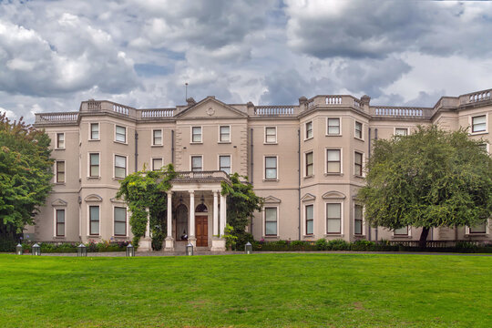 Front facade of Farmleigh House in Dublin, Ireland. Daytime view showcasing grand eclecticism architecture