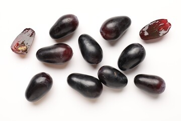 Fototapeta premium Fresh ripe grapes on white background, flat lay