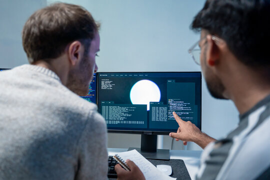 Software engineering use computer working develop AI office are assisting algorithm systems or verifying code. Programmer teamwork using artificial intelligence on laptop analysis or writing coding