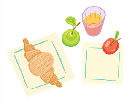 Flat lay breakfast with croissant on napkin, pear, apple, juice