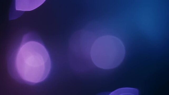 Overlapping Bokeh Circles Creating Blue And Purple Glowing Lights Backdrop For Abstract Digital Backgrounds And Vibrant Design Projects