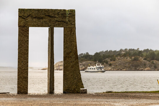 Stromstad, Sweden A granite sculpture in the harbour called Porten mot V&auml;ster, The Gate Towards the West by artist Claes Hake from 2012.