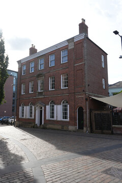 Georgian red brick house on a cobbled street at Leicester in England