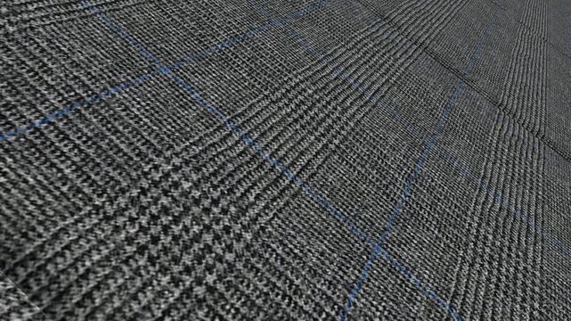 Dramatic Cinematic Movement Along Italian Dark Gray Glen Plaid Flannel Wool Fabric with Angled Perspective, Soft Shadows and Detailed Classic Checks
