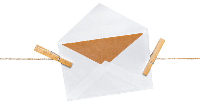 Envelope pinned on a string with clothespins, showcasing a simple way to display mail or letters