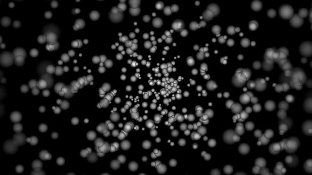 黒背景「立体的な丸い水玉・泡粒子」が中央から溢れ出るアニメーション動画素材