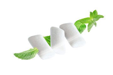 Menthol chewing gum pieces and mint leaves in air against transparent background © New Africa