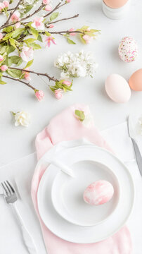 Elegant easter brunch setting with vintage linens and silverware