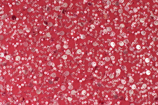 Fabric with sequins and beads on satin