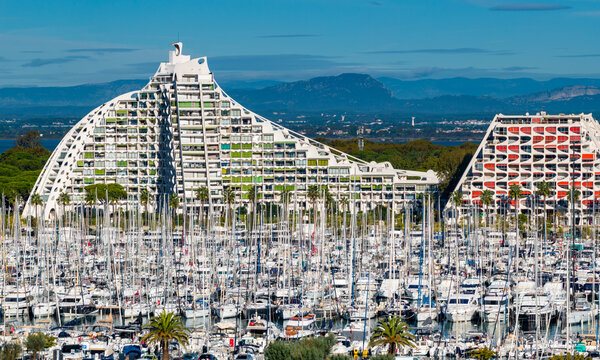 Aerial view of La Grande-Motte pyramidal architecture and Mediterranean coastline in south France 
