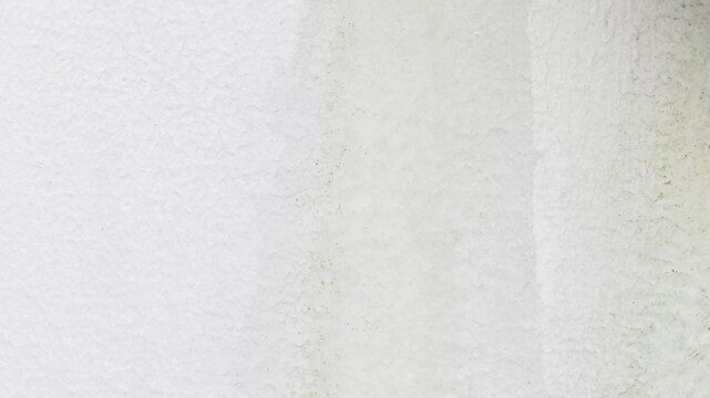 Textured white plaster wall desktop wallpaper with subtle roughness and light shadowing