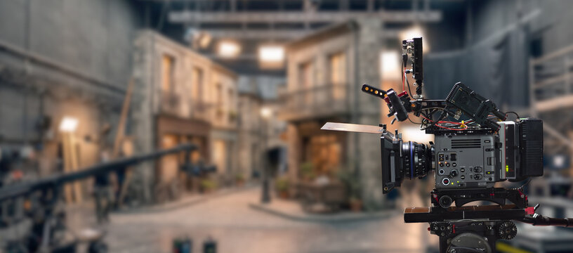 A film camera on a movie set during the filming of a movie. Banner with copy space
