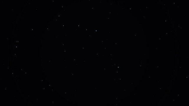 Innumerable distant glowing stars glimmer throughout the vast and expansive dark night sky to create a serene celestial atmosphere that inspires feelings of wonder regarding the infinite deep
