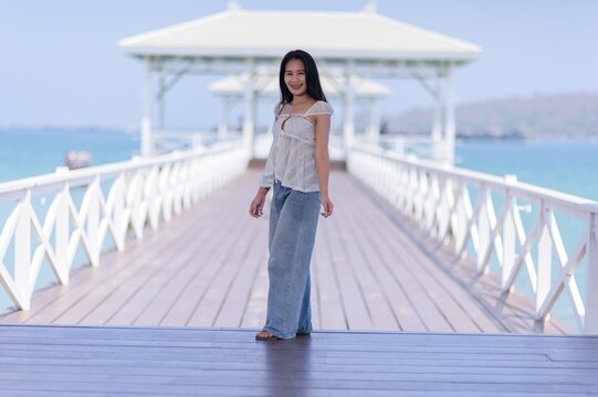 Beautiful Young Woman Posing on Pier in Koh Si Chang, Thailand