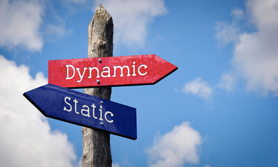 Dynamic or static - wooden signpost with two arrows, sky with clouds © PX Media