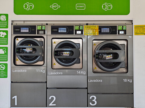public laundromat, front-loading washing machines, Palma, Mallorca, Balearic Islands, Spain