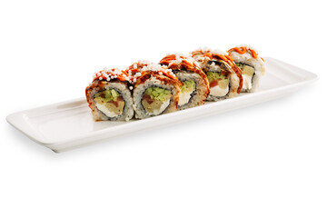 Assorted sushi rolls with rice, seaweed, vegetables, and orange topping arranged on a white rectangular serving plate against a clean white background © Кирилл Горшков