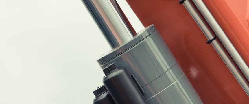 Grey piston or actuator in pneumatic or hydraulic machine. Technology